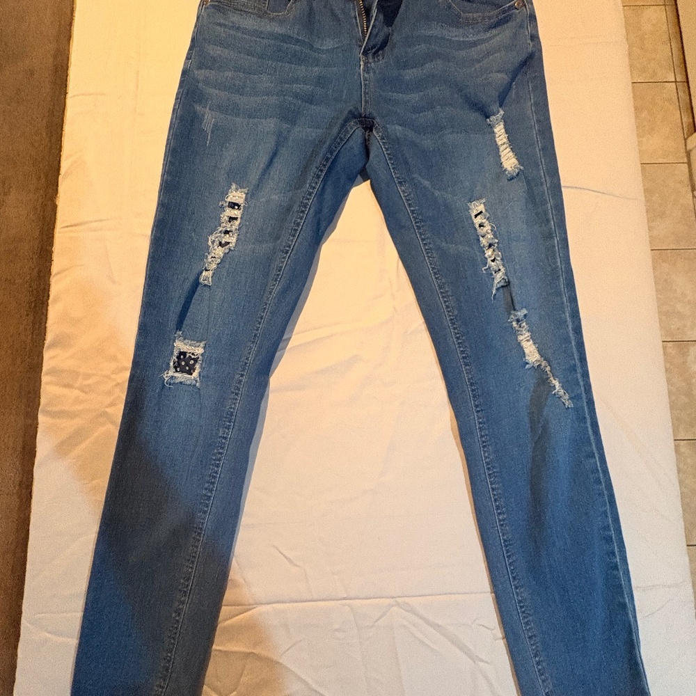 Distressed high rise skinny jeans